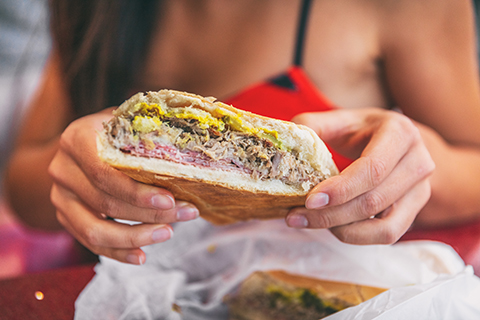 This is a stock photo. An up close image of a Cuban sandwich.
