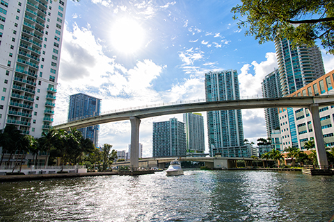 This is a stock photo. Views of buildings from the Miami river in Miami, Florida.