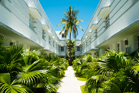 This is a stock photo. An apartment building in the Miami Beach neighborhood of Miami Florida.